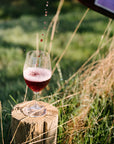 Blind Corner Organic and Biodynamic Margaret River Nouveau being poured into a glass in an outdoor setting