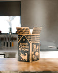 Blind Corner Wine Club box opened on a kitchen bench with 'Blind Corner is Home' text on the side