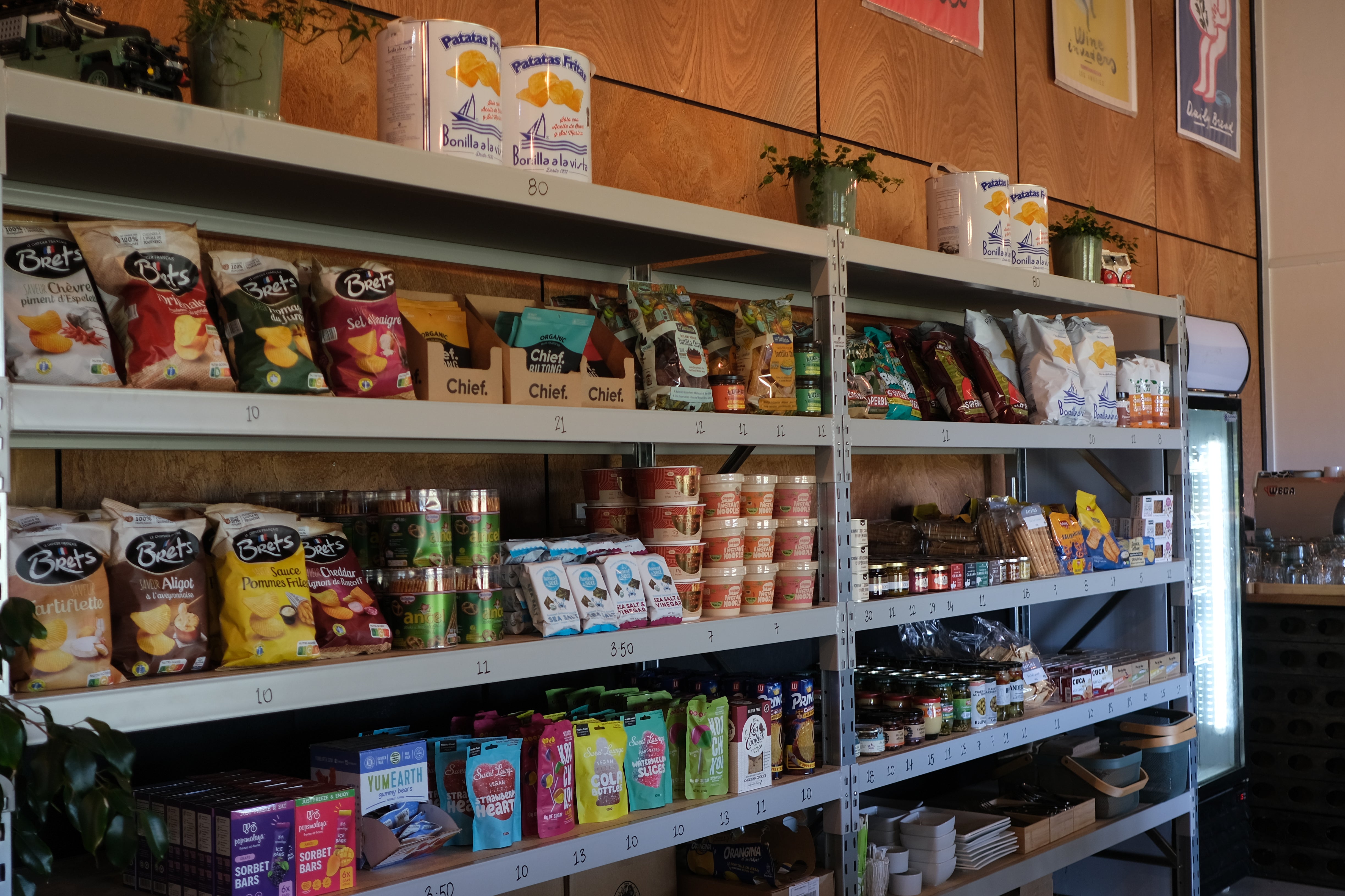 Shelves stocked with various organic and natural food products in a store setting