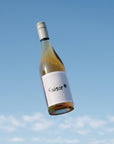 Blind Corner Organic Biodynamic Margaret River Grigio Bottle against a bright blue sky