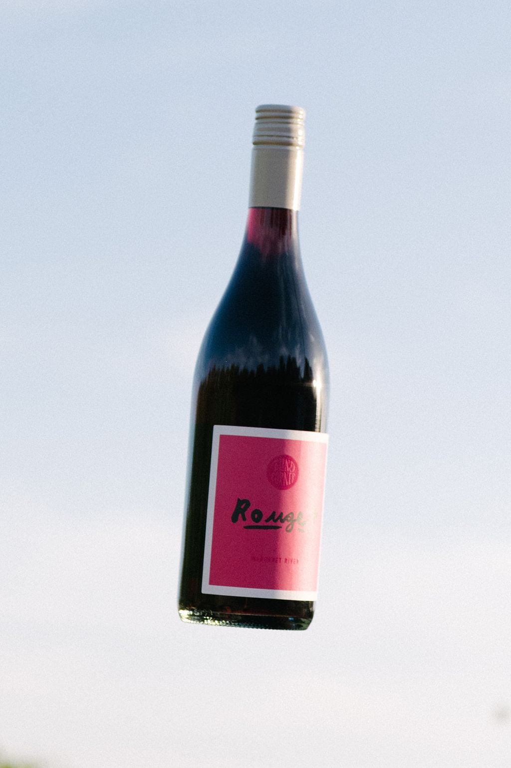 Blind Corner Organic and Biodynamic Margaret River Rouge against the sky
